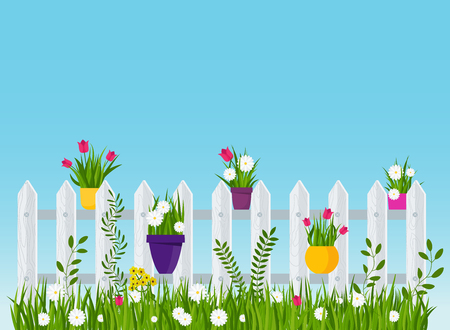 A wooden fence, a hedge near with a flower bed. Scene, landscape in the village or in the country. Garden and garden tools. Flat vector illustration.のイラスト素材