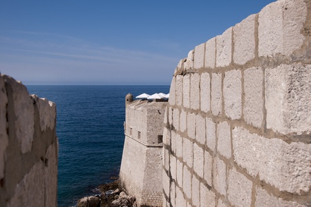 Walking the City Wall of Dubrovnic in Croatia Europe looking down on the city.の写真素材