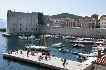 Walking the City Wall of Dubrovnic in Croatia Europe looking down on the city. It is one of the most prominent tourist resorts of the Mediterranean, Dubrovnik is nicknamed "Pearl of the Adriatic"のeditorial素材