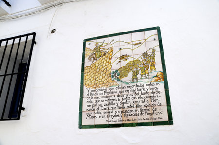 Memorial plaque to the Battle of Frigiliana in 1495  when it was the last moorish village was conquered by King Ferdinand and Queen Isabellaのeditorial素材