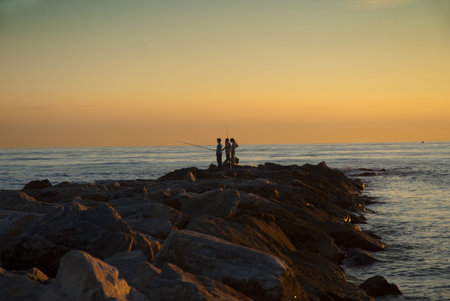 Fishermen in the Sunset over the beach in Marbella on the CostaDel Sol Spain