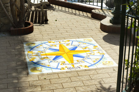 Ceramic tiles of the winds on the pavement on street in Anacapri, Capri Italyのeditorial素材