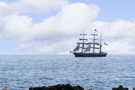 sailing ship off the Rocks of the Sirene on the Isle of Capri Italyのeditorial素材