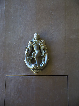 doorknocker in the Beautiful Medieval City of Bologna Italy. Bologna is the capital city of Emilia-Romagna, in the Po Valley of Northern Italyのeditorial素材
