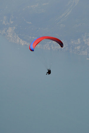 Hangglider from the top of Monte Baldo above Malcesine Lake Garda Italyのeditorial素材