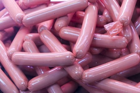 Sausages wrapped in plastic looking skins in Budapest Hungaryの写真素材