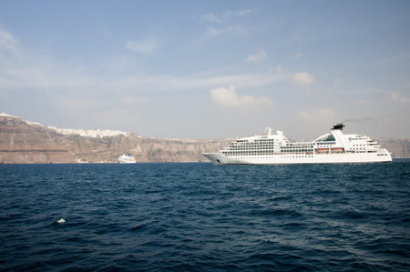 Cruise Ship in the Caldera of the Island of Santorini Greeceの写真素材