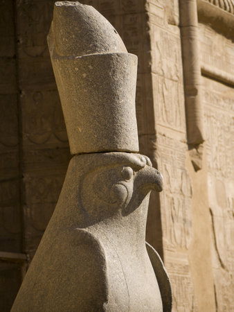 Statue of God Horus at the Temple at Edfu in Egypt which is dedicated to the God Horusのeditorial素材