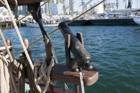 Small Signal Gun on Tall Sailing Ship in Harbour of San Diego California USA
