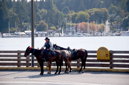 Cowboy waiting for a ride on Bainbridge Island Seattle USAのeditorial素材