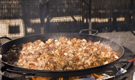 Cooking a gigantic paella on the beach at Nerja Andlucia Spainの写真素材