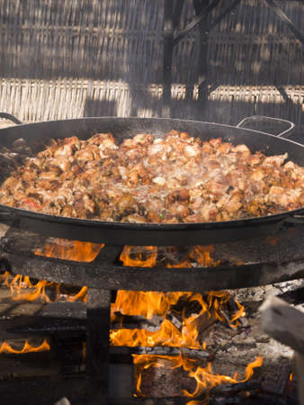 Cooking a gigantic paella on the beach at Nerja Andlucia Spainの写真素材