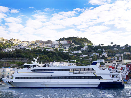 Ferry in Marina Grande Harbour on the Isle of Capri Italyの写真素材