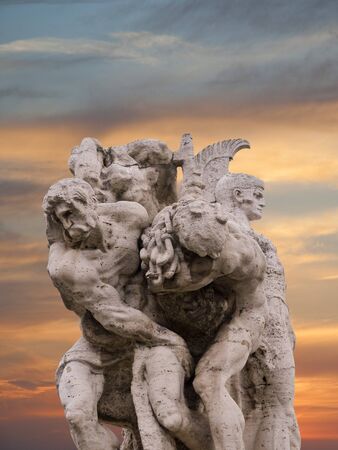 Statue on Bridge of Vittorio Emanuele 11 in Rome Italyの写真素材