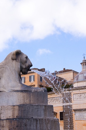 Piazza de Popolo Lion Fountain in Rome Italyの写真素材