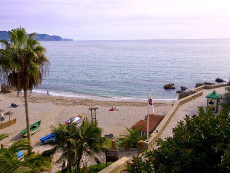 Beach scenes in Nerja, a sleepy Spanish Holiday resort on the Costa Del Sol  near Malaga, Andalucia, Spain, Europeのeditorial素材