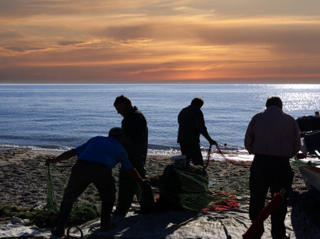 evening Falls on the Burriana Beach in Nerja Spainのeditorial素材