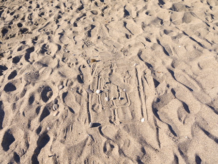 Game drawn on the Burriana Beach at nerja Spainのeditorial素材