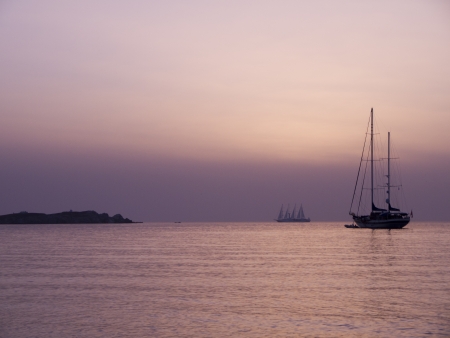 Sunset over the island of Mykonos Greeceの写真素材