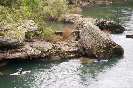 Canoeist in Mostar in Bosnia and Herzegovina is the most important city in the Herzegovina region. The Old Bridge is one of the cityのeditorial素材