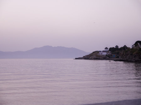 Sunset over the island of Mykonos Greeceのeditorial素材