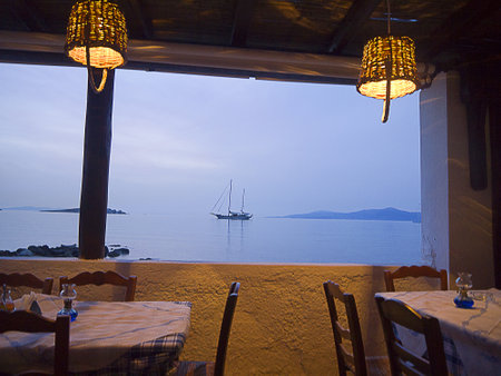 Sunset from a Beach Taverna on the Island of Mykonos Greeceのeditorial素材