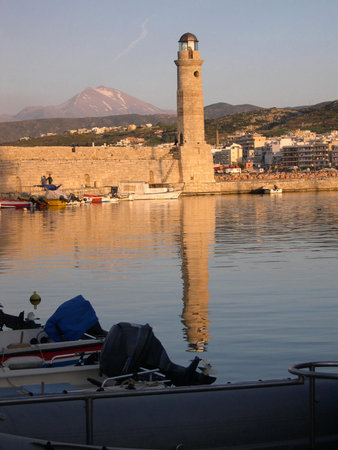 The Lighthouse at the entrance to the Harbour at Rethymno in Crete Greeceのeditorial素材