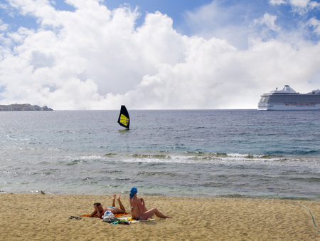 Windsurfer off the beach in Mykonos Greeceのeditorial素材