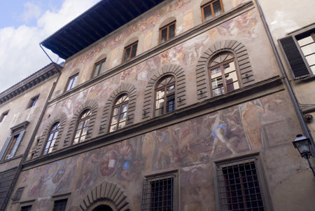 Building covered in medieval frescoes in Florence Italyのeditorial素材