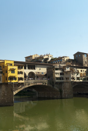 The Ponte Vecchio over the River Arno in Florence Tuscany Italyのeditorial素材