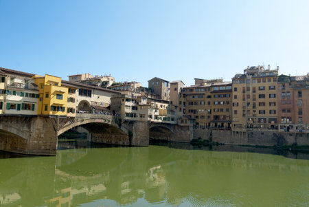 The Ponte Vecchio over the River Arno in Florence Tuscany Italyのeditorial素材