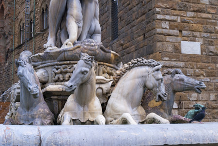 The Neptune Fountain in the Piazza Della Signoria in Florence Tuscany Italyのeditorial素材
