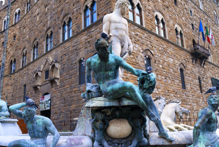 The Neptune Fountain in the Piazza Della Signoria in Florence Tuscany Italyのeditorial素材
