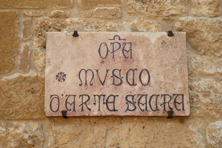 Sign for Museum of Sacred Art in San Gimignano Tuscany Italyのeditorial素材