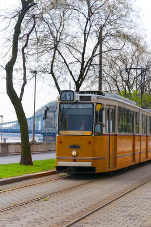 Tram along the banks of the River Danube in Budapest Hungaryのeditorial素材