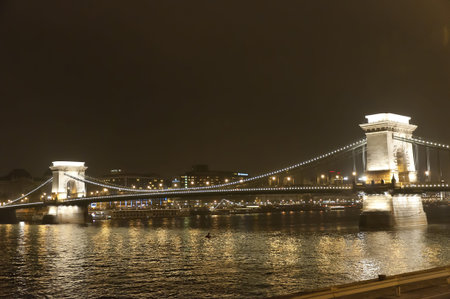 The Chain Bridge and the River Danube by night in Budapest Hungaryのeditorial素材