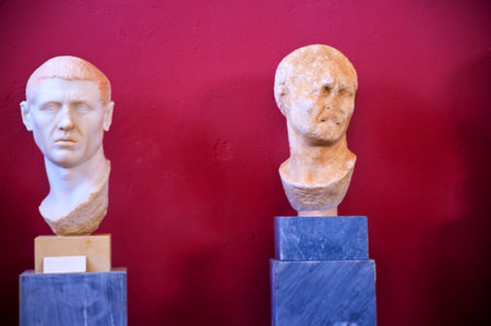 Sculptured heads on the Temple Island of Delos in the Cyclades Islands Greece