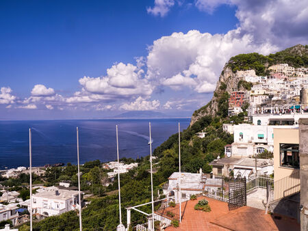 Capri is an Italian island off the Sorrentine Peninsula, on the south side of the Gulf of Naples  It has been a resort since the time of the Roman Republicの写真素材