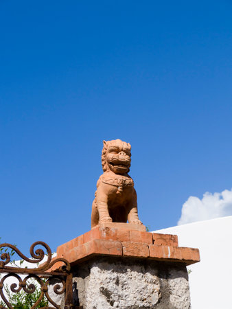 Chinese Lions guard the gate on the island of Capri Italyのeditorial素材