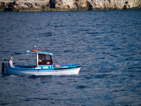 fishing boat off Sorrento Italyのeditorial素材