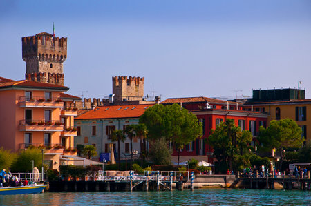 Sirmione is one of the lovely small towns on this lake in Northern Italy with a Scalieri Castle guarding the town  Lake Garda is a popular European tourist destination situated near the Dolomites and Italian Alps のeditorial素材