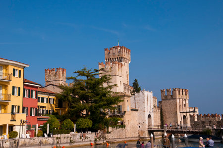 Sirmione is one of the lovely small towns on this lake in Northern Italy with a Scalieri Castle guarding the town  Lake Garda is a popular European tourist destination situated near the Dolomites and Italian Alps のeditorial素材
