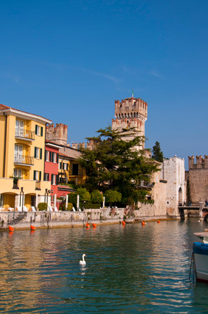 Sirmione is one of the lovely small towns on this lake in Northern Italy with a Scalieri Castle guarding the town  Lake Garda is a popular European tourist destination situated near the Dolomites and Italian Alps のeditorial素材