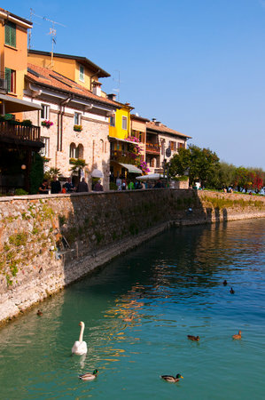 Moat around the castle at Sirmione on Lake Garda Italyのeditorial素材