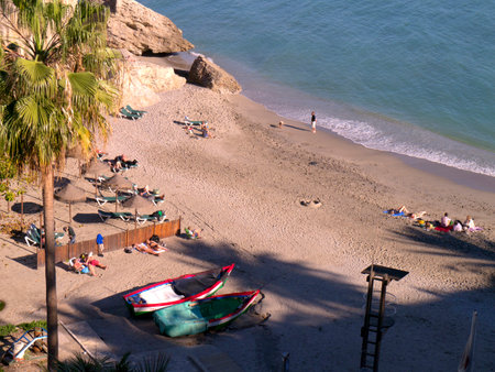 Beach scenes in Nerja, a sleepy Spanish Holiday resort on the Costa Del Sol  near Malaga, Andalucia, Spain, Europeのeditorial素材