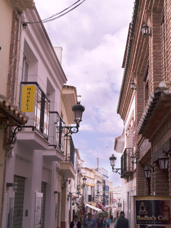 Street scene in Nerja, a sleepy Spanish Holiday resort on the Costa Del Sol  near Malaga, Andalucia, Spain, Europeのeditorial素材