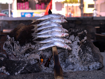 Sardines on spit on the Burriana Beach in Nerja Costa del Sol