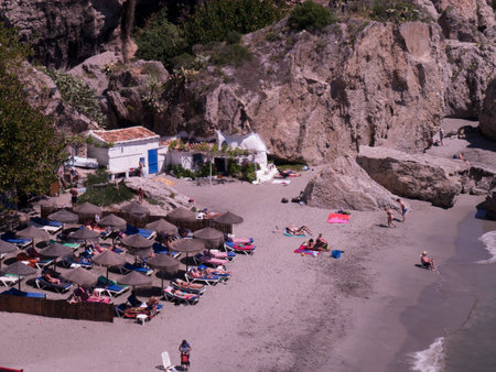 Beach scenes in Nerja, a sleepy Spanish Holiday resort on the Costa Del Sol  near Malaga, Andalucia, Spain, Europeのeditorial素材