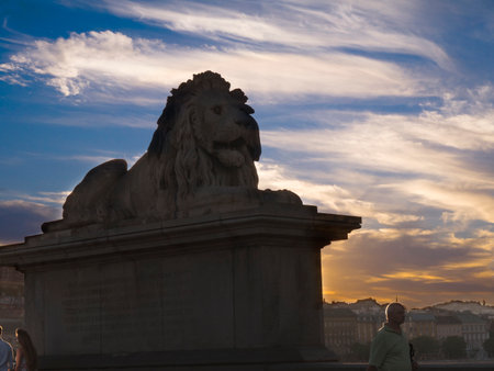 Lion on the Chain Bridge over the River Danube in Budapest Hungaryのeditorial素材
