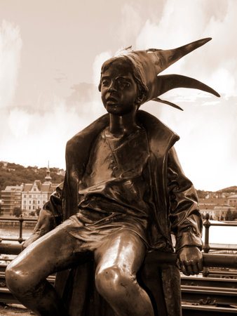 Statue of the Boy Jester on the banks of the River Danube in Budapest Hungaryのeditorial素材